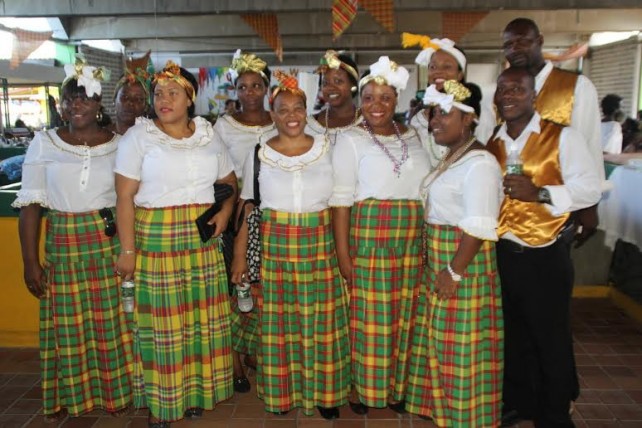 Members of the Paix Bouche Cultural Group poses with Roslyn Paul, MP for Paix Bouche 