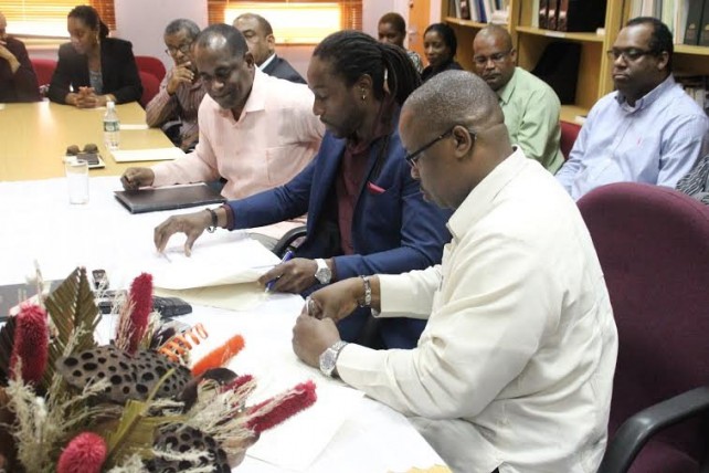 Prime Minister, Roosevelt Skerrit (third from right) attended the signing ceremony