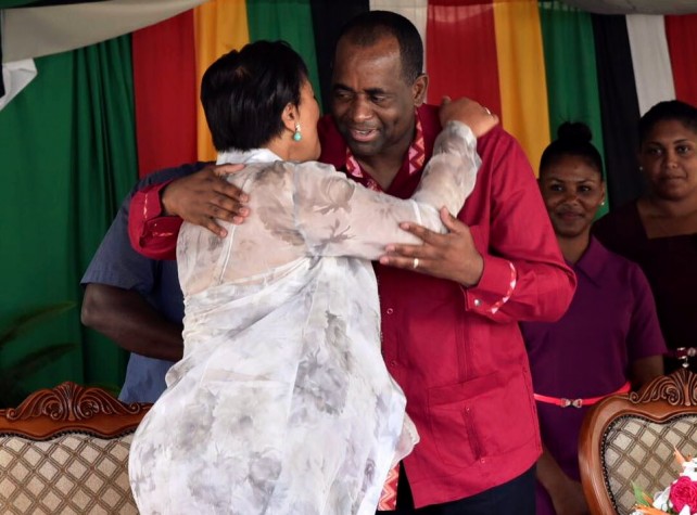 Prime Minister Skerrit hugs Baroness Scotland at the function in Vieille Case. Photo: OPM 