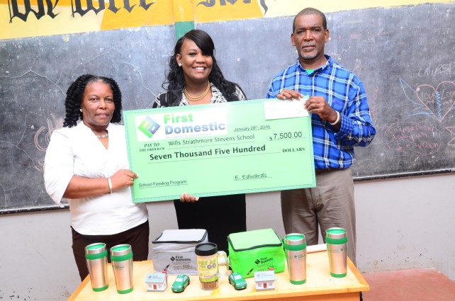 Principal, Alvin Abraham (far right), displays cheque with FDIC Sales & Marketing Manager, Bertillia Bethel (far left)