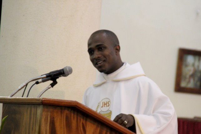 Auguiste addresses the congregation after his ordination last year 