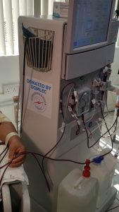 Domlec presents dialysis machine to PMH
