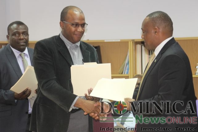 Tourism minister Robert Tonge (left) shakes hands with Martin 