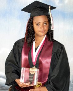 Dominican named Valedictorian at university in US