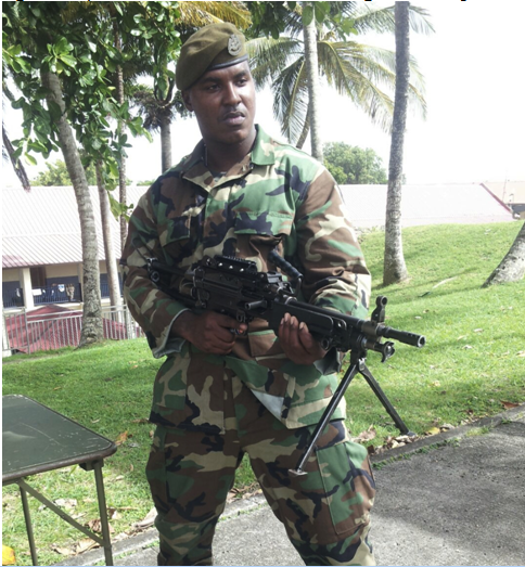 Sgt. Sandy armed with machine gun