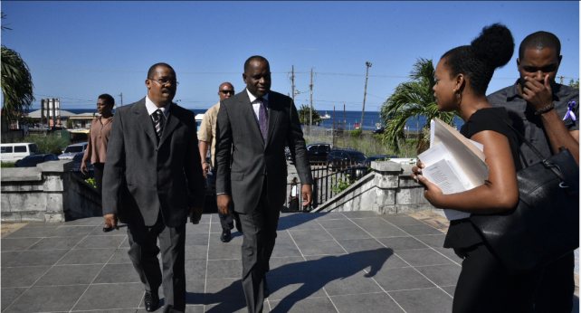 PM Skerrit and Cuba's ambassador to Dominica enter the church building 