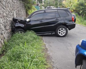 Vehicle crashes into wall at Castle Comfort