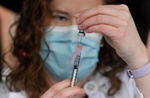 COMBATTING COVID: Vaccine roll-out begins in US, first vaccination done today
