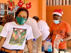 Miss Dominica 2020 shares the gift of Christmas with the Grotto Home   