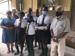 Laptops donated to Goodwill Secondary School and Dominica Grammar School