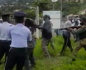 Dominica police clash with protesting bus drivers, one individual injured by rubber bullet