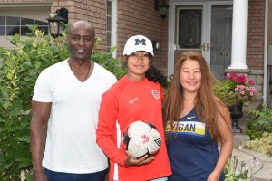 Canadian footballer of Dominican heritage celebrates first Olympic gold medal