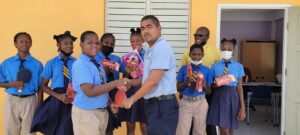 Table tennis association donates gear to primary school in Marigot