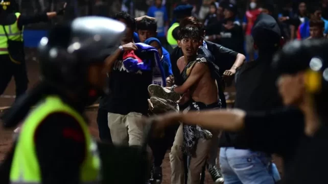 Indonesia: Fans ‘died in the arms’ of players in stadium crush