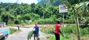 Dominica Red Cross and Loubiere Village Council collaborate to install hazard warning signs in the community