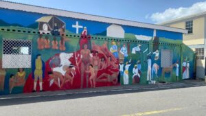 Citizens unite to restore Massacre’s historic Kalinago mural