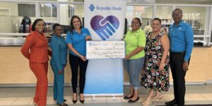 Republic Bank  presents cheque to PMAD partner, West Dominica Federation
